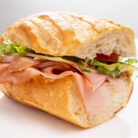 Black Forest Ham · Black forest smoked ham, swiss cheese, tomatoes, romaine lettuce, balsamic vinegar, and oliv...