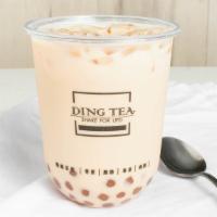 Signature Milk Tea · Add extra topping for an additional charge.
