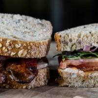 Turkey And Candied Bacon Sandwich · All-natural oven-roasted turkey breast, house-candied bacon, wild arugula, tomato, pickled r...