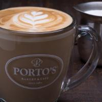 Latte (Café Con Leche) · Medium-roast espresso made from Arabica beans with steamed whole milk. 16 oz.