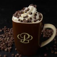Hot Chocolate · New Recipe! Valrhona Dutch-processed chocolate and steamed whole milk topped with whipped cr...