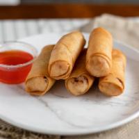 Egg Roll · Deep-fried vegetarian rolls stuffed with mixed vegetables and glass noodles served with swee...