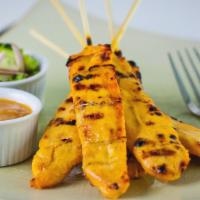 Sa-Tae · Grilled marinated chicken or beef on skewers served with peanut sauce and cucumber salad.