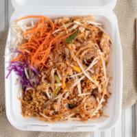 Pad Thai · Stir-fried thin rice noodles with egg, chicken, shrimps, bean sprouts, crushed peanuts and s...
