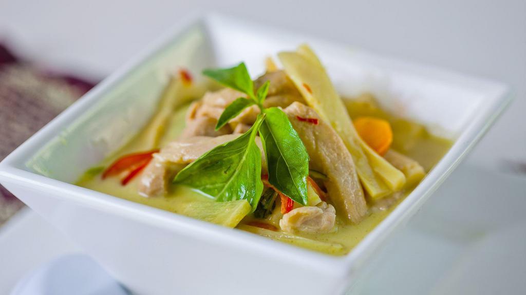 Green Curry · Spicy. Green curry with bamboo shoots, basil, bell peppers, and coconut milk.