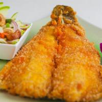 Crispy Trout With Apple Salad · Deep-fried trout fish with apple chili salad.