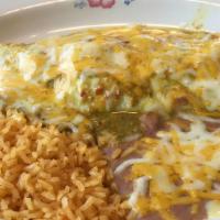 Chile Verde Burrito · Tender pieces of pork slowly simmered in chile verde sauce, and refried beans, wrapped in a ...