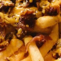 Specialty Fries · Loaded fries with bacon and cheese, garlic cheese fries or chili cheese fries.