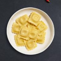 Build Your Own Ravioli · Fresh ravioli cooked with your choice of sauce, veggies, and meats and topped with black pep...