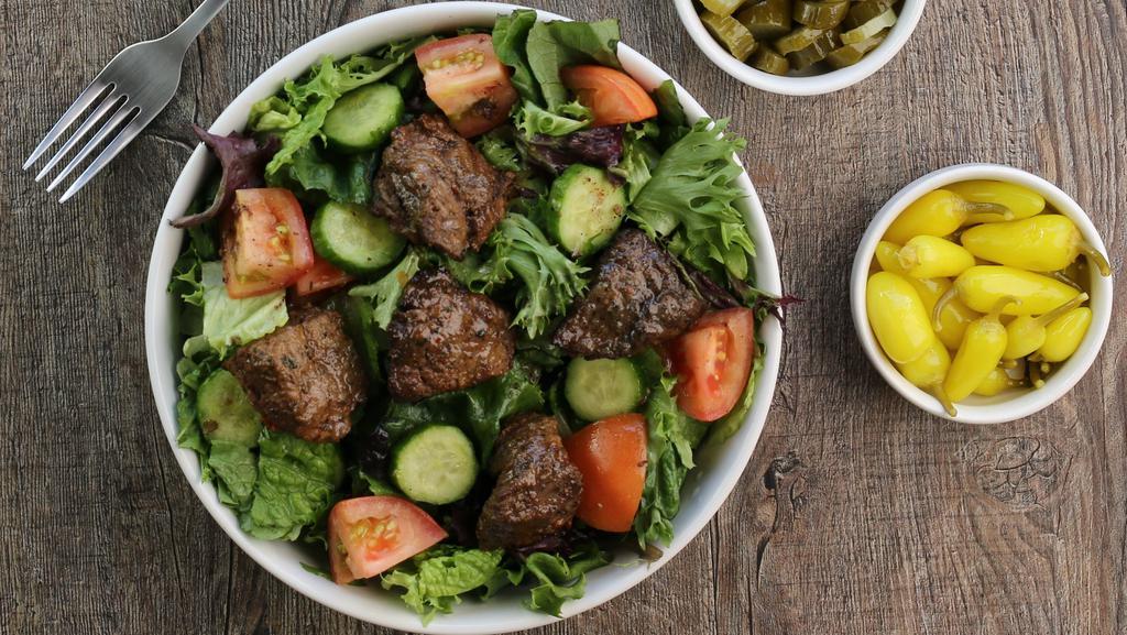 Beef  Salad · Romaine lettuce, tomatoes, and cucumbers with house dressing. 
Choice of Beef Shawarma or Beef Kabob