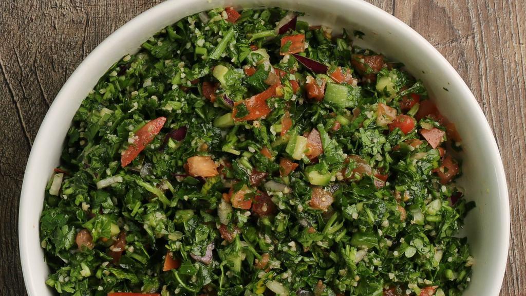 Tabbouleh · Small only. A Middle Eastern salad of bulghur (cracked) wheat, fine chopped parsley, tomatoes, onions, mixed with lemon juice & olive oil.