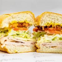 Turkey & Bacon · Toasted sub, mesquite smoked turkey, bacon, provolone, lettuce, tomato, ranch, mustard, mayo.