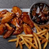 10 Piece Wing Combo  · Make it a combo! 10 bone-in wings tossed in your choice of up to two flavors, house-seasoned...