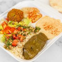 Vegetarian Plate · Hummus, babaghanouj, tabouleh, salad, rice pilaf, eggplant mix, sarma, falafel and pita bread.