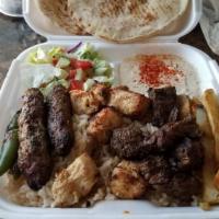 Lamb Shish Kabob Plate · Served with hummus, rice, salad and pita bread.