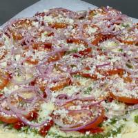 Mediterranean · Pesto sauce, mozzarella, garlic, sun dried tomatoes, fresh tomato, red onion, feta and parme...