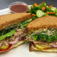 Tuna On Deck Sandwich · Lightly Seasoned Tuna with mayo, mustard, provolone cheese, tomato, pickle, red onion, leaf ...