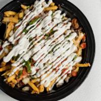 Carne Asada Fries · Fries topped cooked with cheese, sour cream, pico de Gallo