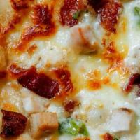 Chicken Bacon Pizza · White cream sauce, mozzarella, chicken, bacon, and ranch.