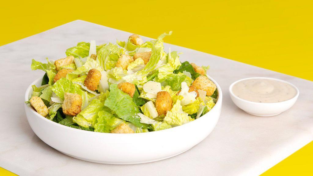 Caesar Salad · Caesar salad with parmesan cheese, croutons, and Caesar dressing on the side.