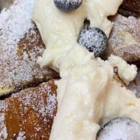 Dj Squalls · Thick Slices of Brioche French Toast topped with ricotta and bluberries