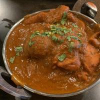 Mango Chicken Curry · Chicken cooked with mango and spices to make a sweet and savory curry