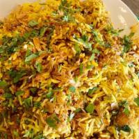 Chicken Biryani · Made with basmati rice, spices and chicken