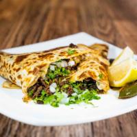 Quesadilla · Fresh Flour Tortilla stuffed with cheese and your choice of meat.