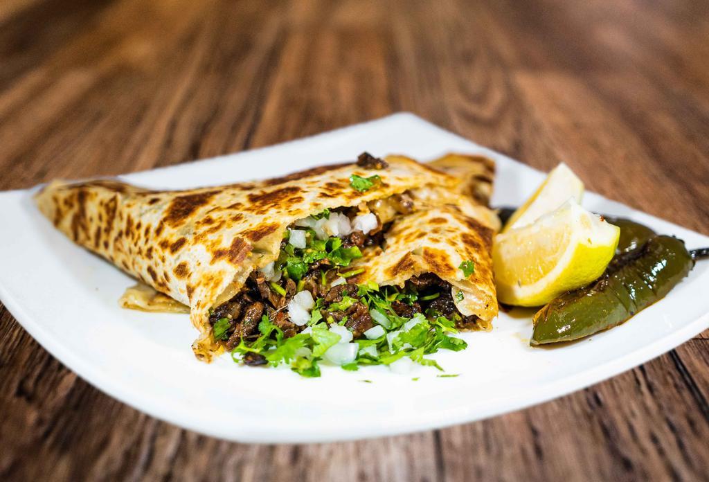 Quesadilla · Fresh Flour Tortilla stuffed with your choice of cheese and your choice of meat.
