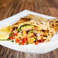 Quesadilla De Camaron · Fresh Flour Tortilla stuffed with cheese and your choice of meat.