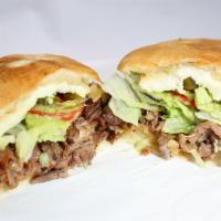 Torta · Delicious Big Sandwhich. Choice of Meat, includes refried beans, lechuga, tomato, fresh chee...