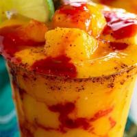 Mango Chamoy · Fresh mango slush with CHamoy and Tajin drizzled.