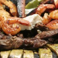 Molcajetes	 · Served with spicy sauce on the side, steak, chicken, shrimp, cheese, nopal, onion, rice, bea...