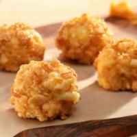 Mac-N-Cheese Fritters · Cracker crusted and served with comeback sauce.