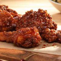 Korean-Style Fried Chicken · Classic Fried Chicken tossed with Korean-style Sauce. 4 pieces.