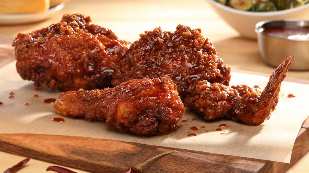 Korean-Style Fried Chicken · Classic Fried Chicken tossed with Korean-style Sauce. 4 pieces.