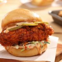 Nashville Chicken Sandwich · Spicy fried chicken sandwich with comeback sauce and pickle on a buttered bun.