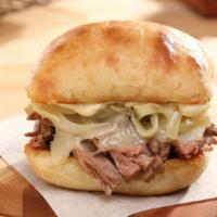 Braised Beef With Swiss And Horseradish Mayo Sandwich · Braised beef on a Ciabatta bun with horseradish mayonnaise, Swiss cheese, and grilled onion.