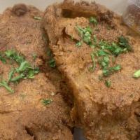 Fried Pork Chops · 2 center cut pork chops dipped in our 