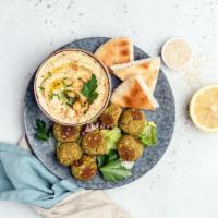 Falafel Plate · Mix of golden fried fava beans and garbanzo with garlic, onions, herbs and spices, served wi...