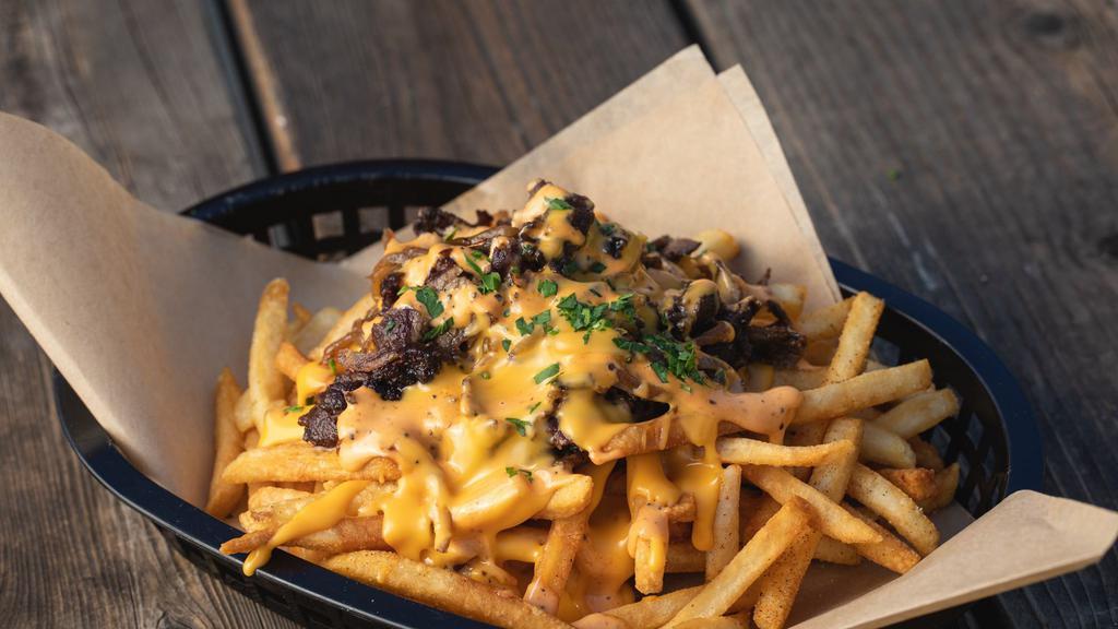 Steak Fries · Grilled ribeye or chiken breast, cheese whiz, grilled onions and Lil' Joe's 