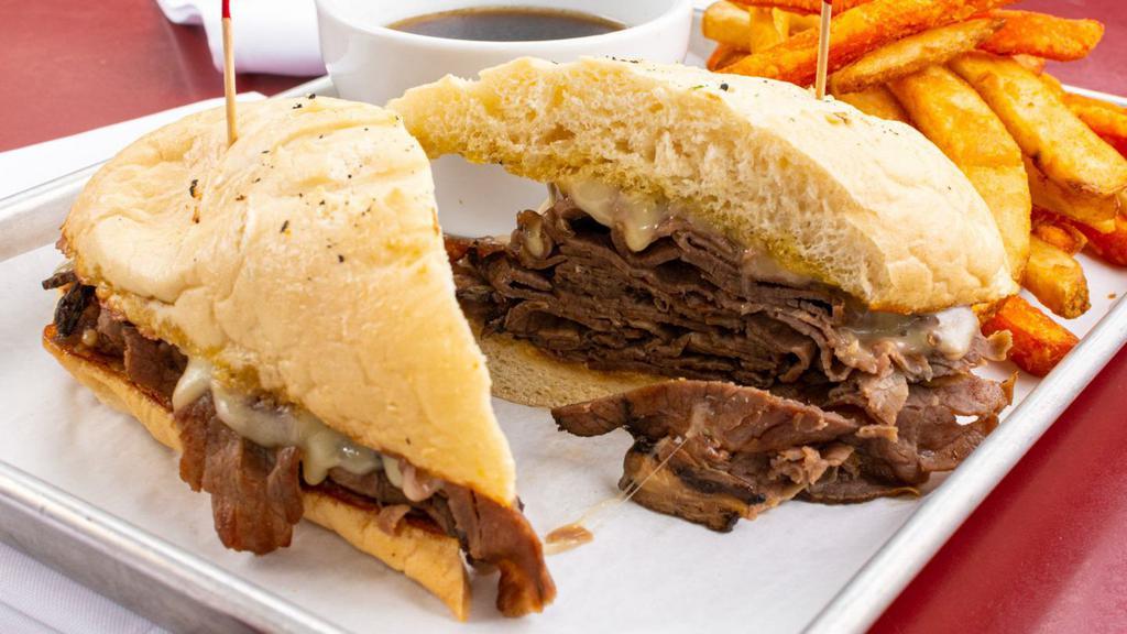 French Dip · Served with melted swiss cheese and au jus