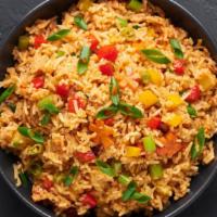 Vegan Pineapple Fried Rice · Vegan fried rice with pineapple, onions, and sauce and your choice of tofu or mixed vegetabl...