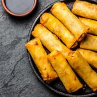Fresh Vegetable Spring Rolls (2) · 2 egg rolls filled with vegetables and served with dipping sauce.