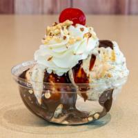 2-Scoop Sundae · Your choice of 2 scoops of ice cream, topping, whip cream, almonds and cherry.