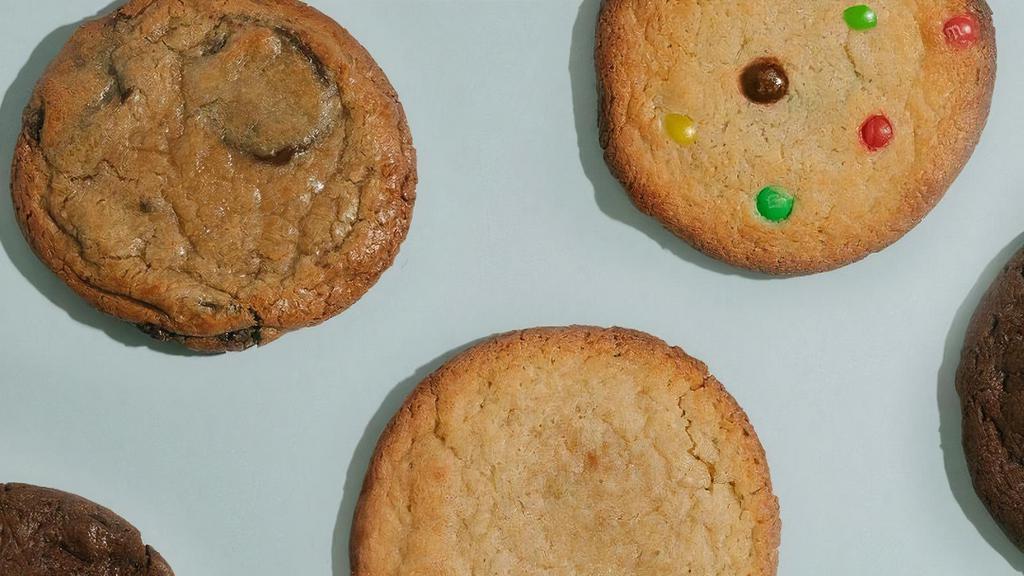A Dozen Cookies + 1 · We will send you 4 Chocolate Chip, 3 Snickerdoodle, 3 M+M's, 3 Vegan Double Chocolate