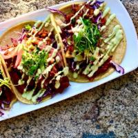 Flight Of Tacos · Select 3:

Carnitas Taco: Mexican spiced, Stone Delicious IPA braised pork, pickled red onio...