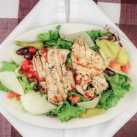 Grilled Chicken Salad · Grilled chicken with Provolone cheese, tomatoes, olives, pepperoncini tossed in our house It...