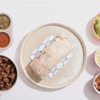 Meat, Beans, And Cheese Burrito · Your choice of meat, cooked or grilled or marinated every day, daily cooked beans, real Mont...