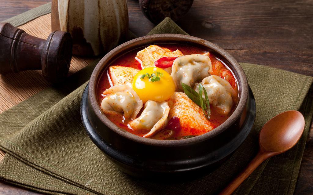 Dumpling · Beef, pork, and vegetable dumplings. Default meat broth, but can be requested with water broth.